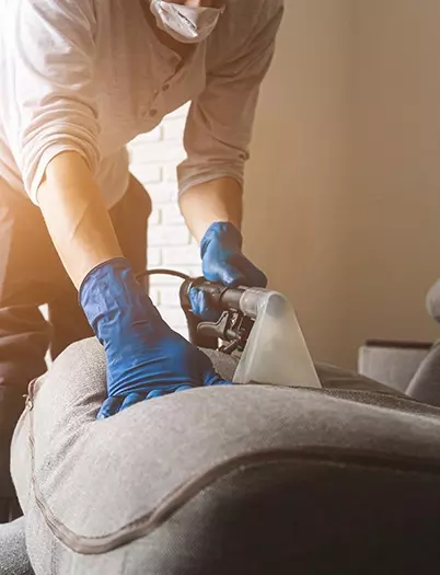 Upholstery and Carpet Cleaning Liverpool and Merseyside - using a deep extraction tool to clean a sofa